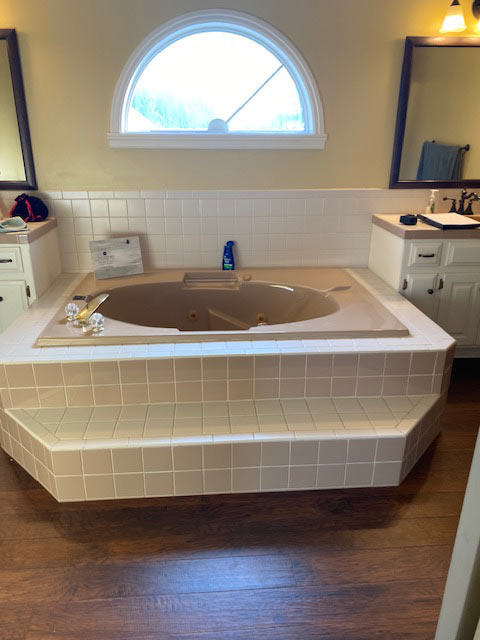 Warm Transitional Primary Bathroom Pewaukee Wisconsin Before